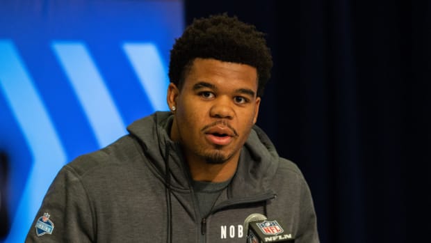 Penn State defensive end Chop Robinson meets with the media at the 2024 NFL Scouting Combine in Indianapolis.